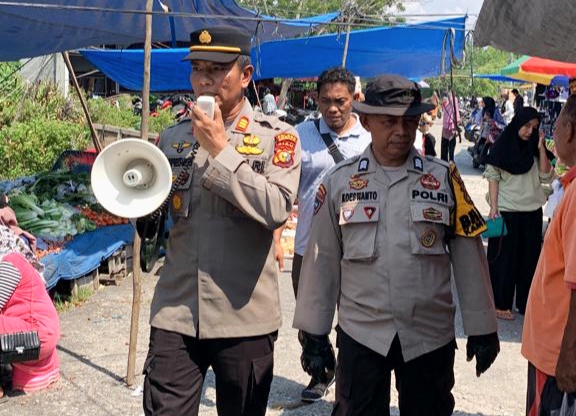 Kapolsek Bukit Batu Turun Sambangi Masyarakat di Pasar Baru Sei Pakning