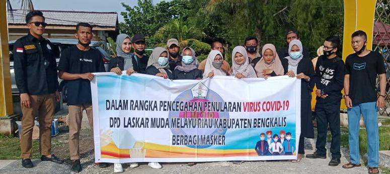 Laksanakan Himbauan Pemerintah, DPD-LM2R Bagikan Masker Kepada Masyarakat